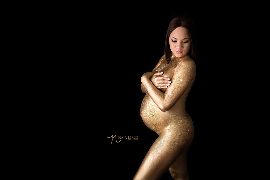 unique themed gold paint maternity pictures 
