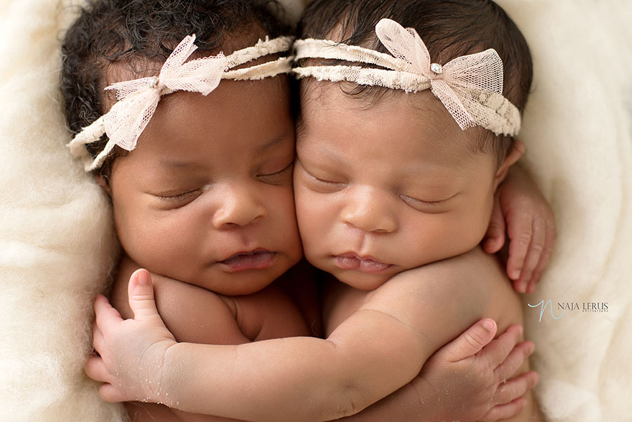 chicago twin babies hugging newborn photography 