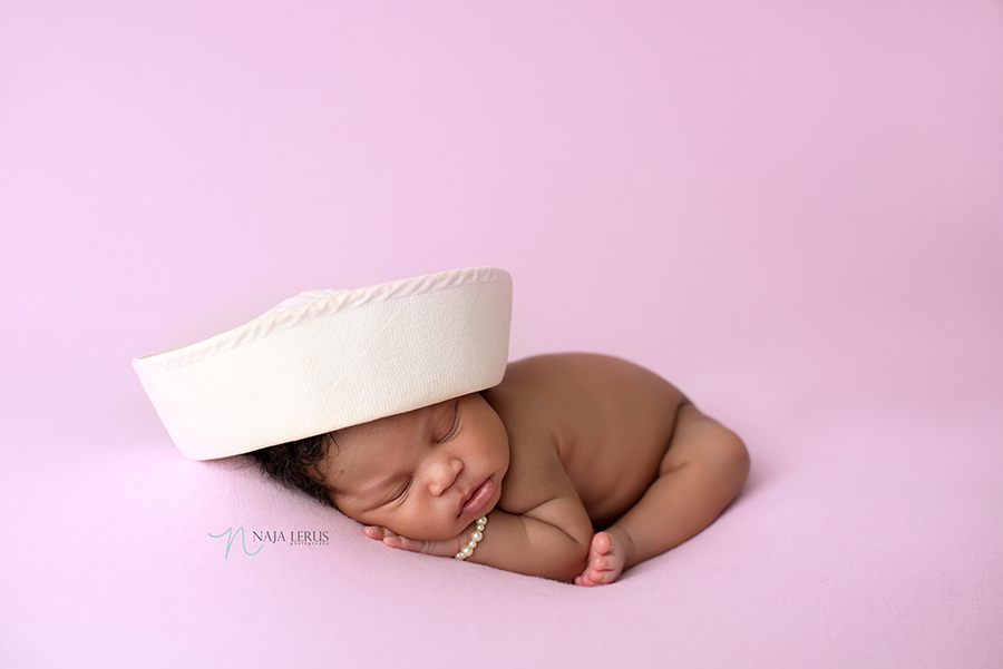 newborn baby chicago IL in dad marine hat