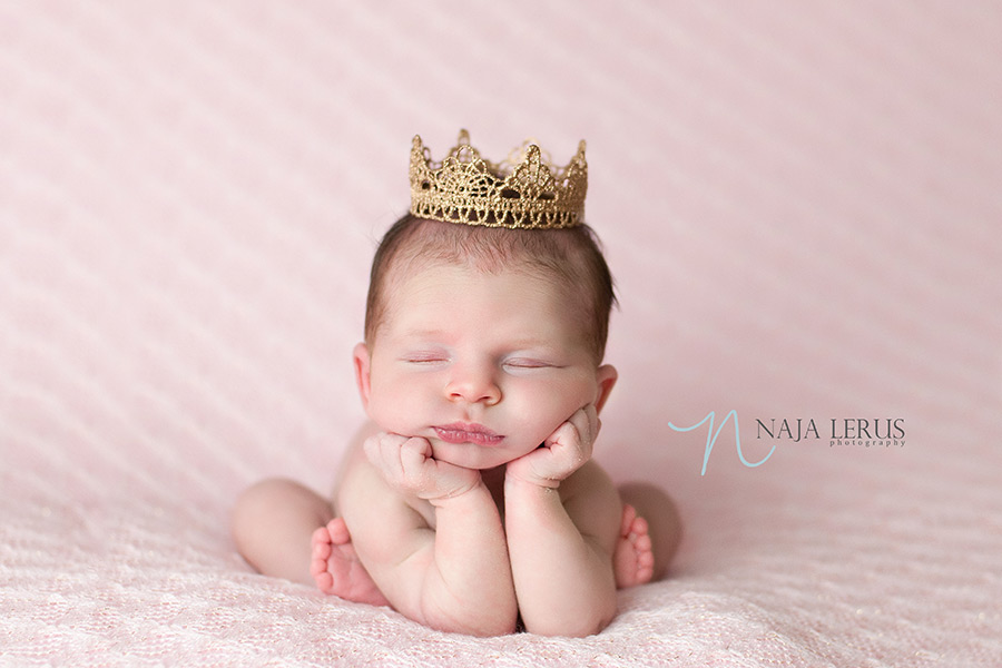 Princess newborn baby girl posing