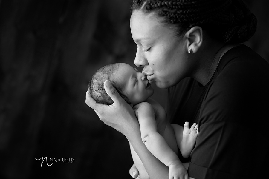 mom baby mother newborn timeless image kissing