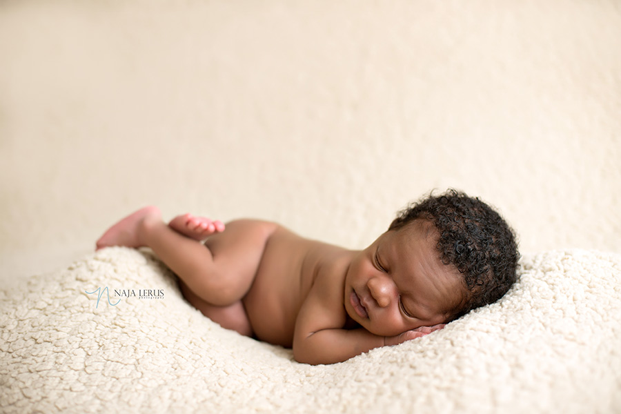 side laying pose newborn photography chicago il pose