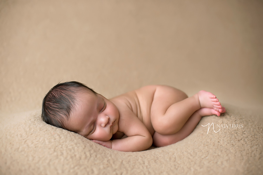 side laying pose newborn pictures photographer chicago