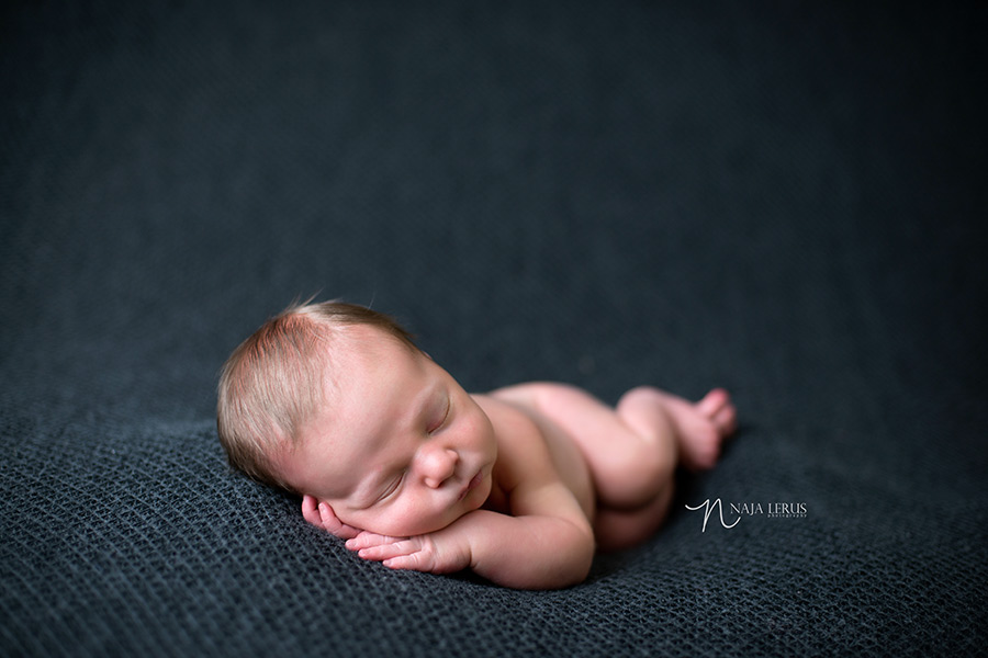 newborn portraits chicago baby side laying pose