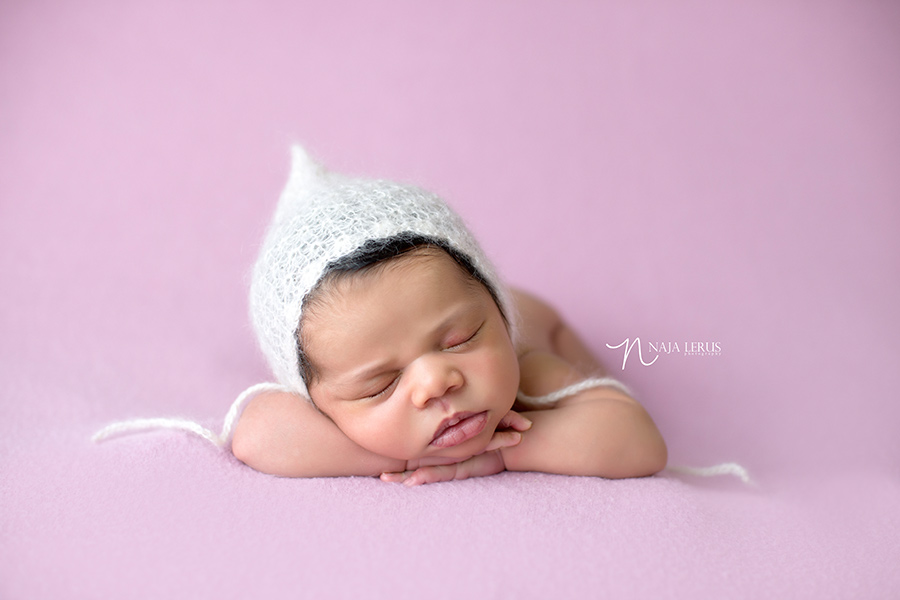 sleepy baby with bonnet newborn chicago photographer
