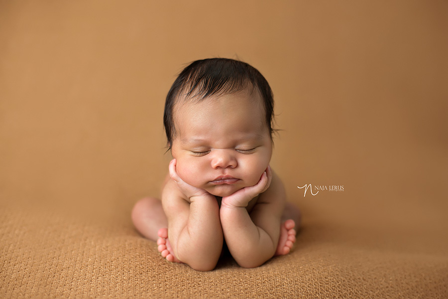 froggy pose hands eating on chi in pose newborn photographer chicago