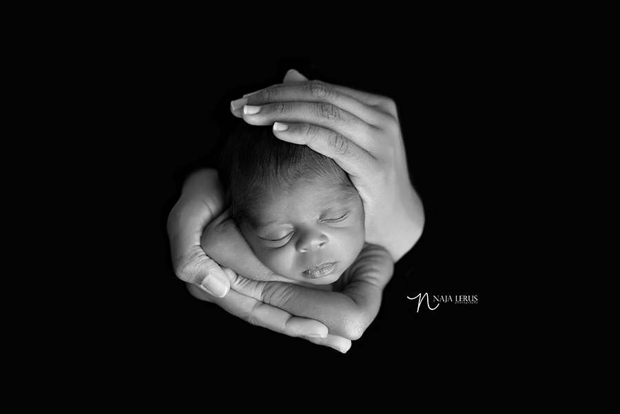 newborn baby in mom's hands chicago