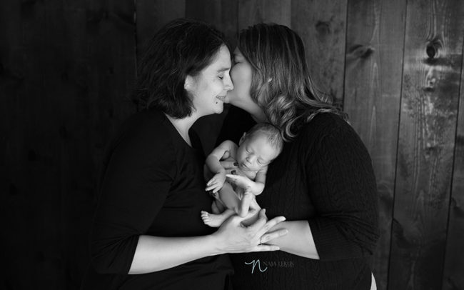 two beautiful mothers with their newborn baby picture chicago il newborn photographer